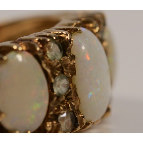 567 - A 9ct gold vintage opal and white gemstone dress ring, London 1973, O 1/2, 4.4g