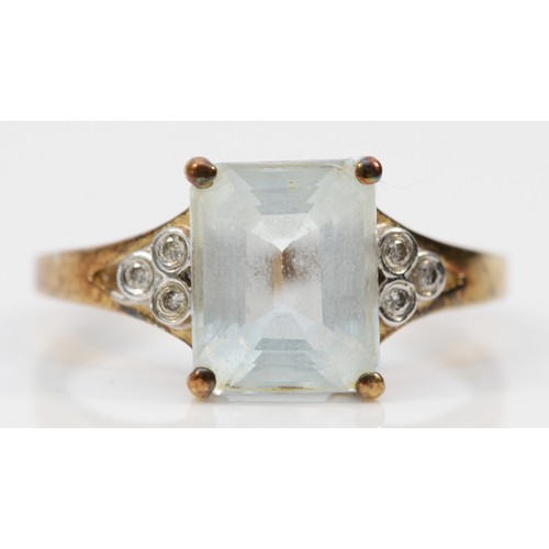 573 - A 9ct gold vintage style aquamarine and diamond dress ring, R, 2.8g