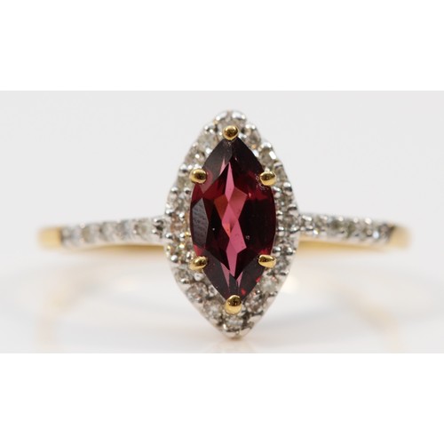 581 - A 9ct gold garnet and diamond cluster ring, T, 2.1g