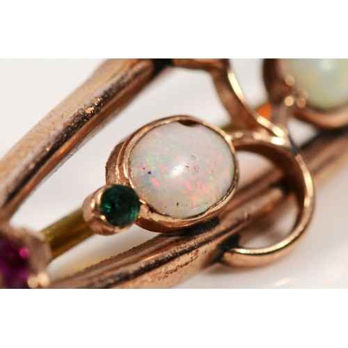 588 - An Edwardian 9ct rose gold opal, red and green gemstone brooch, Chester, 38mm across, 1.8g