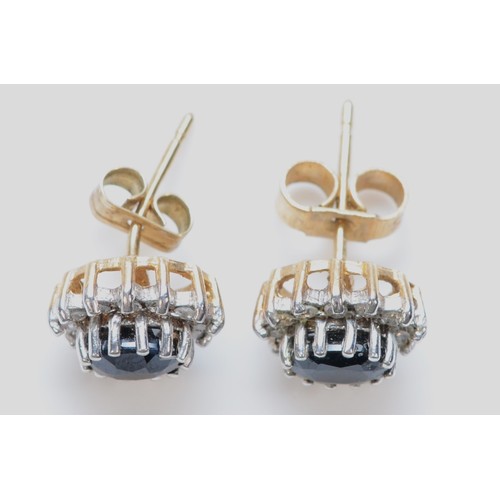 593 - A pair of 9ct gold sapphire and diamond cluster stud earrings with scroll backs, 6mm, 1.6g