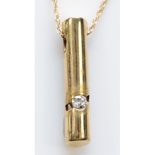 596 - A 9ct gold diamond drop pendant with chain, 20mm drop, 1.6g