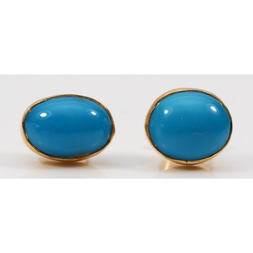 598 - A pair of 14k gold bezel set turquoise stud earrings with scroll backs, 10mm, 3g