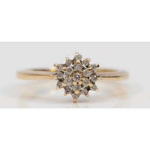 606 - A 9ct gold diamond cluster ring, claw set, P, 3.3g