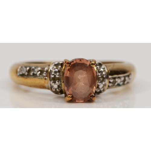 610 - A 9ct gold chestnut and white coloured gemstone ring, N, 3.4g