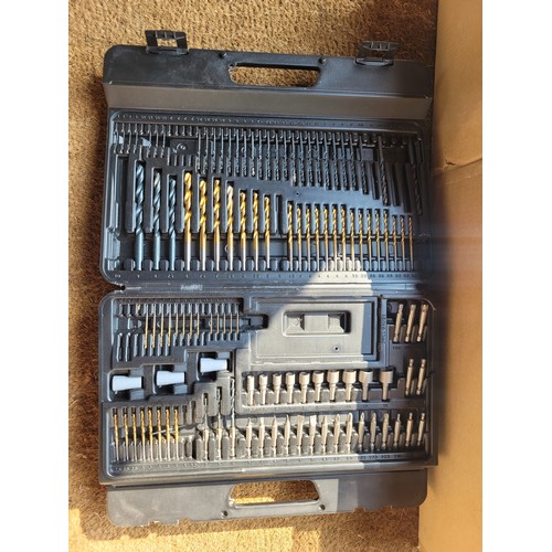 49 - A box of tools to include a Dremel cutter, Black and Decker sander, Performance Power boxed drill se... 