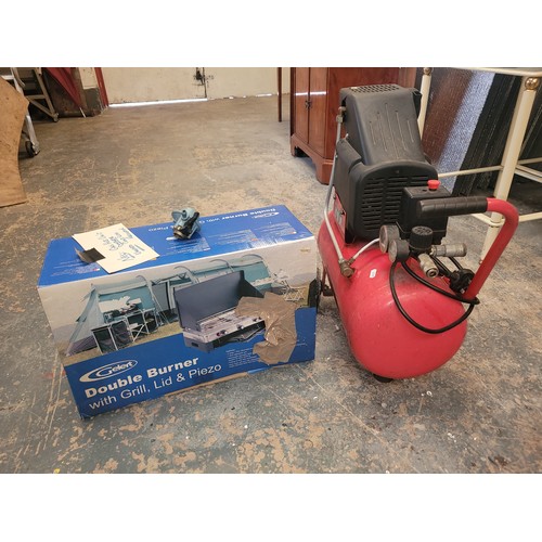 57 - A 240 volt air compressor, together with a Gelert double gas hob burner (boxed as new)