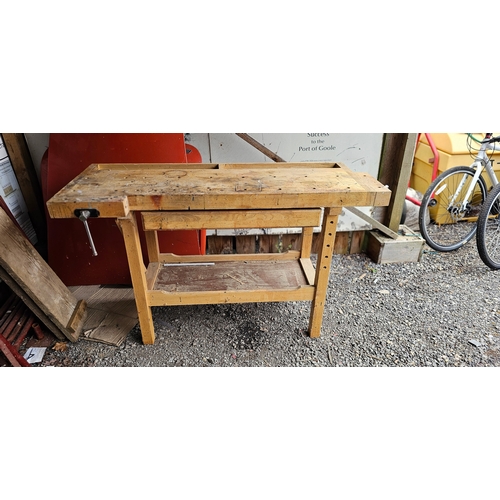 61 - A carpenters work bench with vice