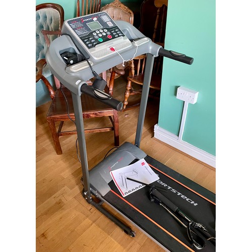 A Sportstech F10 treadmill with manual tested and fully working at time of cataloguing