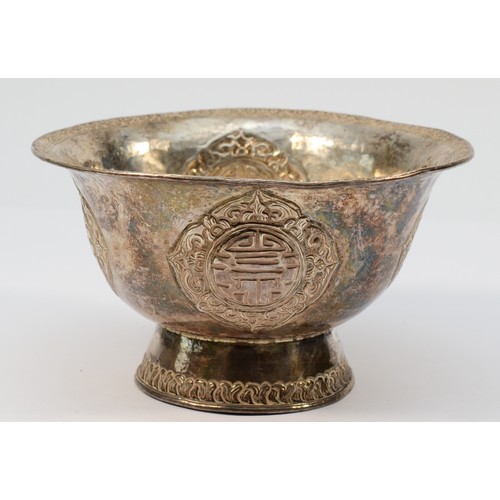 1 - A late 19th century Tibetan silver butter lamp bowl, unmarked, with four character panels, diameter1... 