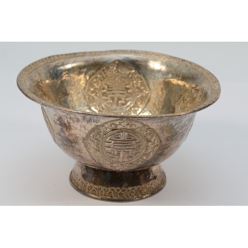 1 - A late 19th century Tibetan silver butter lamp bowl, unmarked, with four character panels, diameter1... 