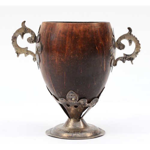 8 - An 18th century unmarked silver and coconut cup, with two handles, raised on a pedestal foot, 10cm