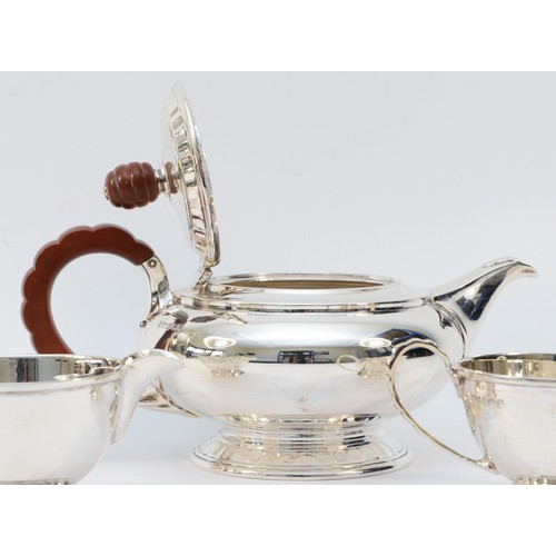 10 - WITHDRAWN 
A silver four piece tea and coffee service, by Mappin & Webb, Sheffield 1957, of circular... 