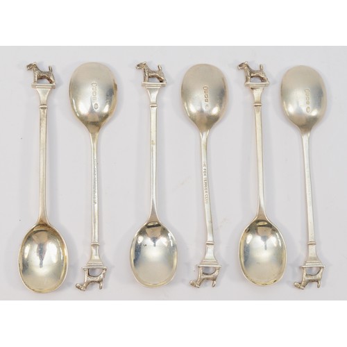 11 - The Fox Terrier Club, a silver set of six tea spoons, Birmingham 3 x 1932, 3 x 1936, with cast termi... 