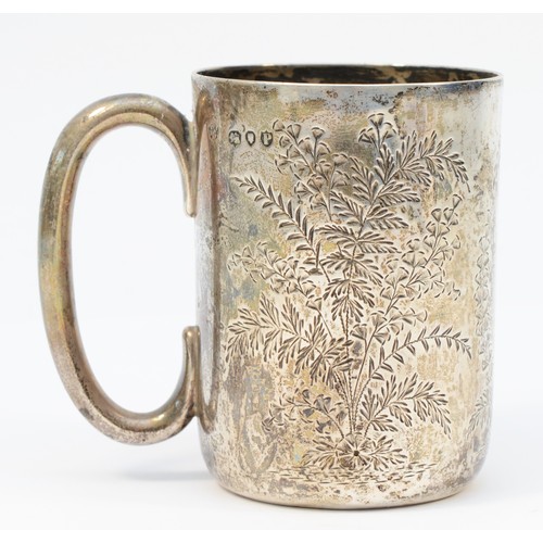 14 - A Victorian silver christening mug, London 1890, with engraved fern decoration, vacant and unused ca... 