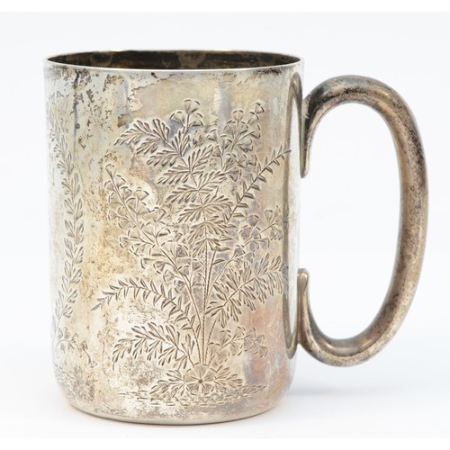 14 - A Victorian silver christening mug, London 1890, with engraved fern decoration, vacant and unused ca... 