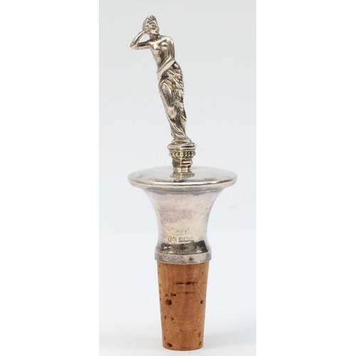 16 - A silver bottle stopper, Sheffield 1998, depicting a scantily clad lady, overall height 13.5cm