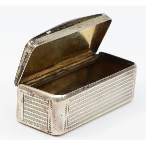 17 - An early 19th century French snuff box, maker TS and weak control mark, with linear engraved decorat... 