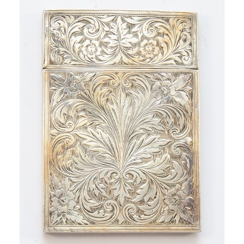 21 - A 19th century unmarked silver visiting card case, with all over floral decoration, 9 x 6.5 x 1cm, 9... 