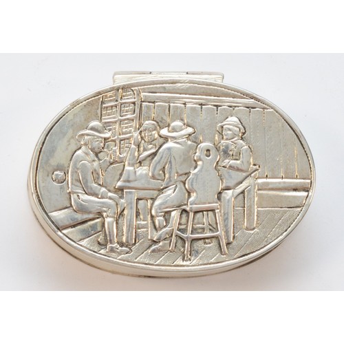 23 - A Dutch 800 standard silver oval box, bearing control marks, embossed with a tavern scene, 6 x 4 x 2... 