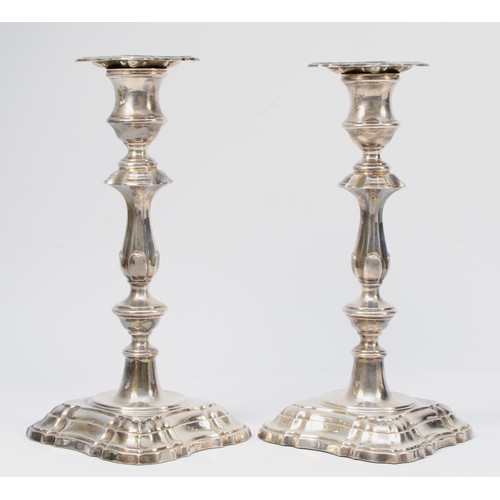 27 - A silver pair of candlesticks, by C.J. Vander, Sheffield 1963, with removeable sconces and knopped s... 