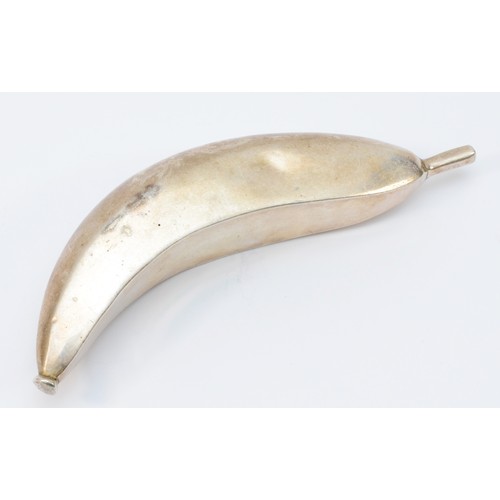 37 - A Zambian silver banana, from the Kabwe region, stamped CM SILVER, 19cm, 202gm, 13.5cm diameter.