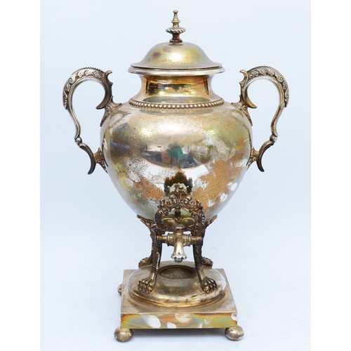 38 - A 20th century electroplated tea urn, by Walker and Hall, with engraved floral decoration, leaf capp... 