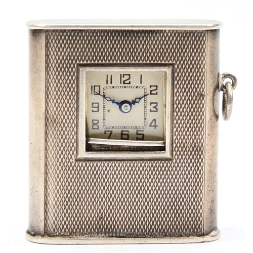 56 - An Art Deco 900 standard silver purse watch, stamped 900, with slide cover revealing the dial, 34 x ... 