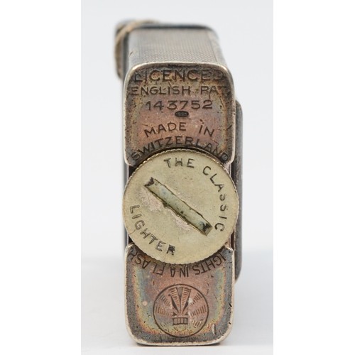 61 - A silver Parker Beacon (Dunhill) lighter, c.1930, import marks Alfred Dunhill Ltd, with novelty watc... 