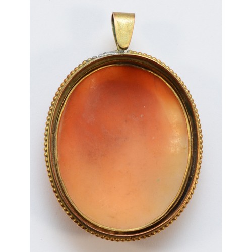 70 - Tomaso Saulini, a Victorian gilt metal mounted shell cameo pendant, depicting a lady, signed T. Saul... 