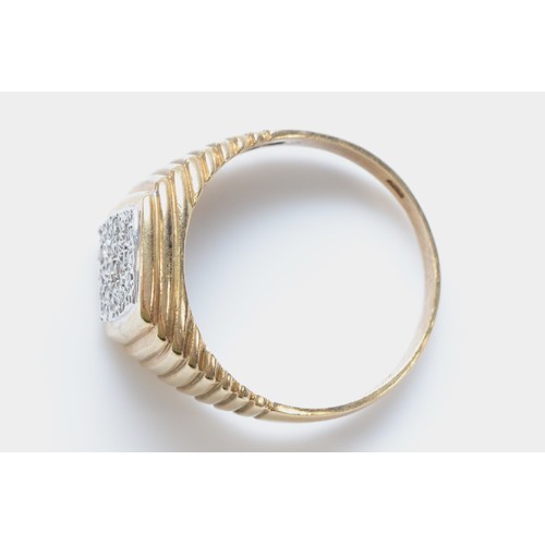 76 - A 9ct gold brilliant cut diamond faced signet ring, stepped detailing to the shoulders, London 1985 ... 