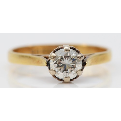 77 - An 18ct gold brilliant cut diamond solitaire ring, London 1981, claw setting, L, 2.8g