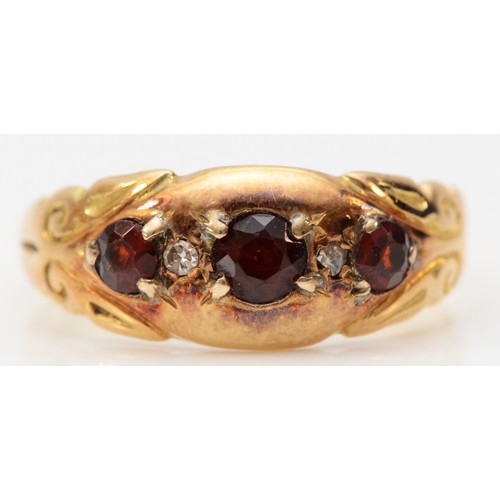 81 - An 18ct gold garnet and diamond five stone ring, Chester 1915, maker H.W.Ld, N, 2.6g