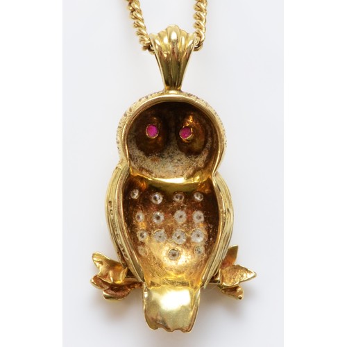 84 - An 18ct gold brilliant cut diamond and ruby pendant in the shape of an owl on a 9ct gold chain, make... 