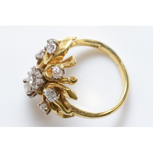 92 - An 18ct gold seven brilliant cut diamond ring, London 1989, maker VP, G, 6.3g