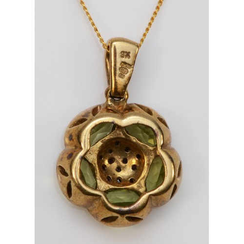 96 - A 9ct gold peridot and diamond cluster pendant with chain, floral shape, 12mm diameter, 2.3g