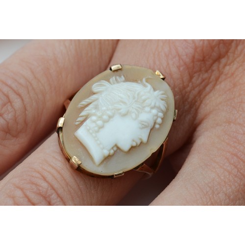 106 - A 9ct gold late Victorian shell cameo dress ring depicting a Bacchanalian lady, L, 3.8g