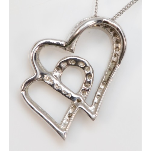 108 - A 9ct white gold diamond interlocking hearts pendant, 15mm pendant, with a chain, 1.9g