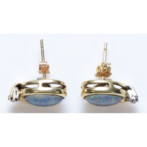 110 - A pair of 14k gold diamond and opal triplet stud earrings with 9ct gold scroll backs, 10mm x 7mm opa... 