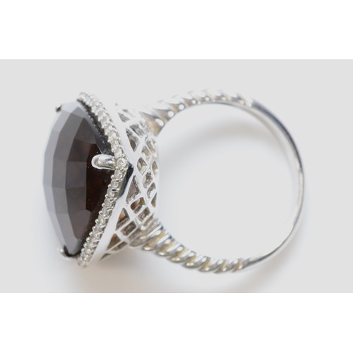 113 - A 14K white gold diamond and smokey quartz cocktail ring, 15mm quartz, N 1/2, 8.8g