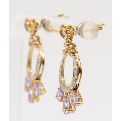 128 - A pair of 9ct gold pear cut tanzanite and diamond drop earrings, 23mm total drop, 2.5g