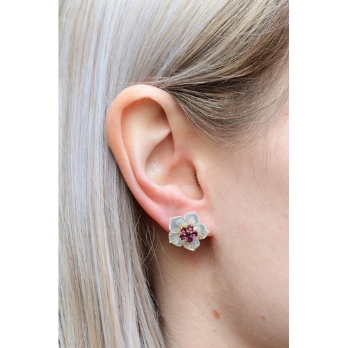 129 - A pair of 9ct gold mother of pearl and purple garnet floral stud earrings, with scroll backs, 15mm, ... 