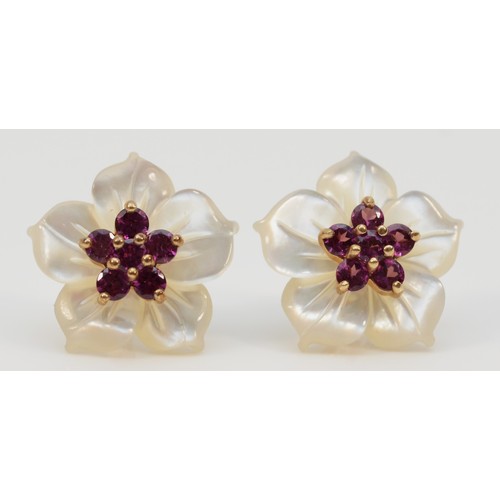 129 - A pair of 9ct gold mother of pearl and purple garnet floral stud earrings, with scroll backs, 15mm, ... 