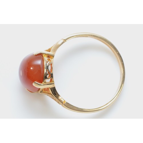 131 - A 9ct gold cabochon cut carnelian dress ring, maker A+C, 3g