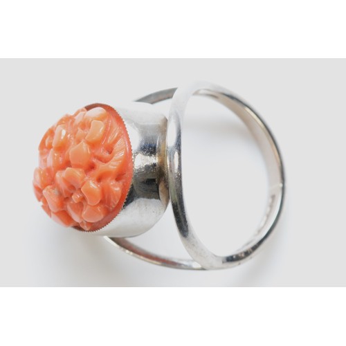 136 - An 18ct gold carved floral coral dress ring, ring front is 18mm top to bottom, J, 6g