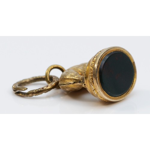 149 - A low carat antique bloodstone elephant fob with a base metal split ring, 15mm high, 6g