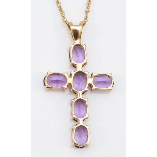 150 - A 9ct gold amethyst cross pendant with chain, 25mm cross length, 2.5g