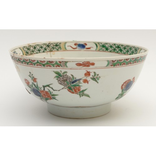 324 - A Chinese Kangxi period famile verte bowl, with blue flower head mark, with floral decoration, 19th ... 