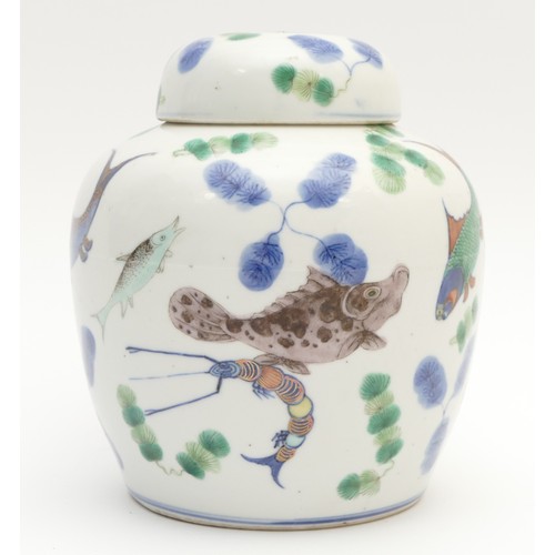 326 - A Chinese Qing period ginger jar and cover, decorated with various fish including koi carp, a crab a... 