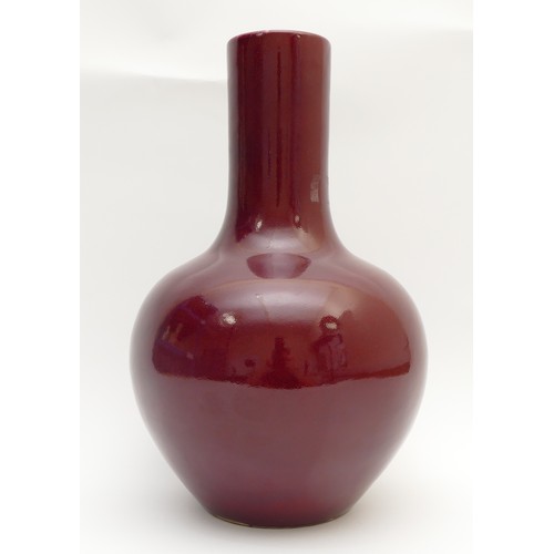 327 - A Chinese ox blood large vase, Qing period, 35.5cm